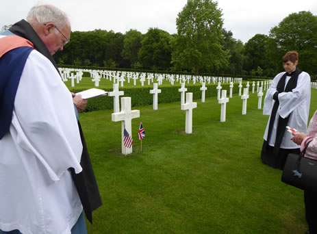 Arch Dcn Authur Hawes leads prayers at Howard Schwegel's grave 4th June 2019